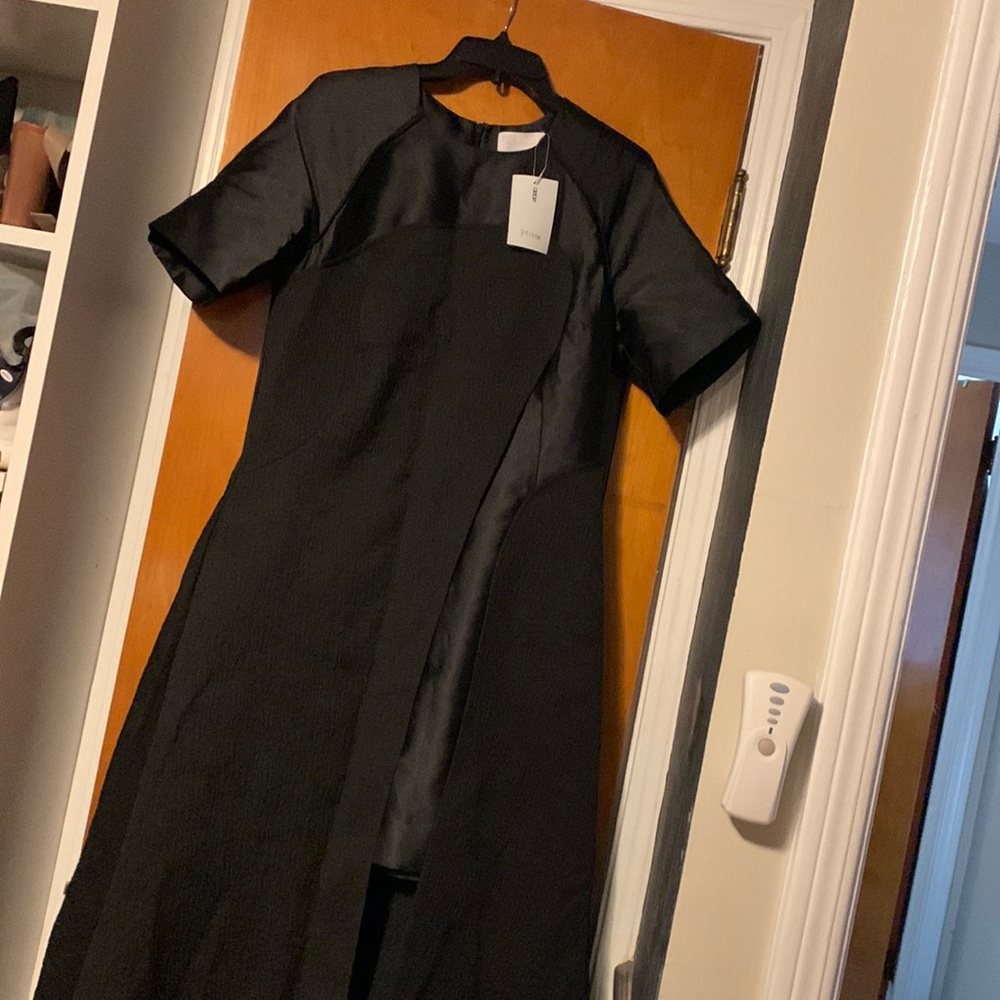 Black asymmetrical dress size US 10